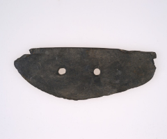 Ground stone tool to pluck heads of grains (stone knife)